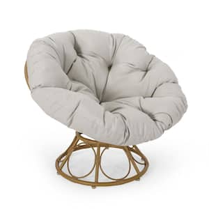 Raylea Swivel Faux Rattan Outdoor Papasan Lounge Chair with Beige Cushion