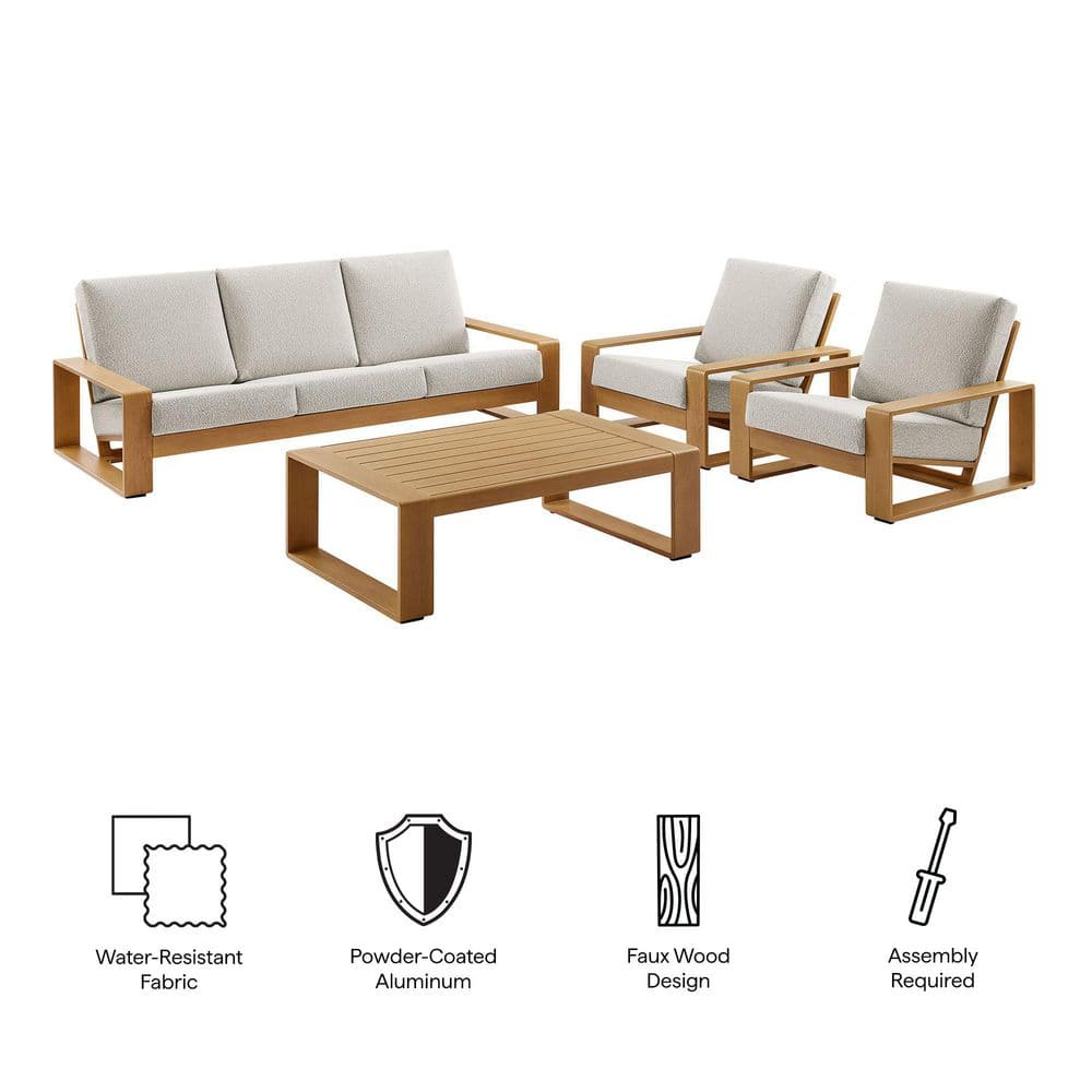 A four-piece outdoor furniture set with a sofa, two armchairs, and a coffee table.