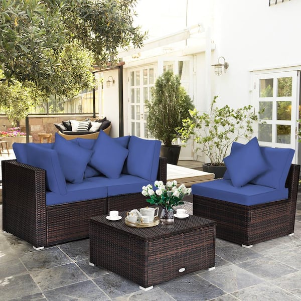 Liviza 4-Piece Outdoor Wicker Patio Conversation Set Brown Finish with Navy Cushions and Pillows