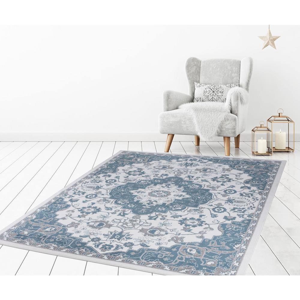 Ivory and Blue Medallion Synthetic 8' x 10' Area Rug