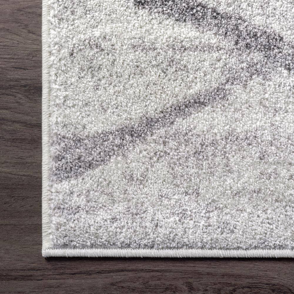 Gray Oval Reversible Stain-Resistant Synthetic Area Rug
