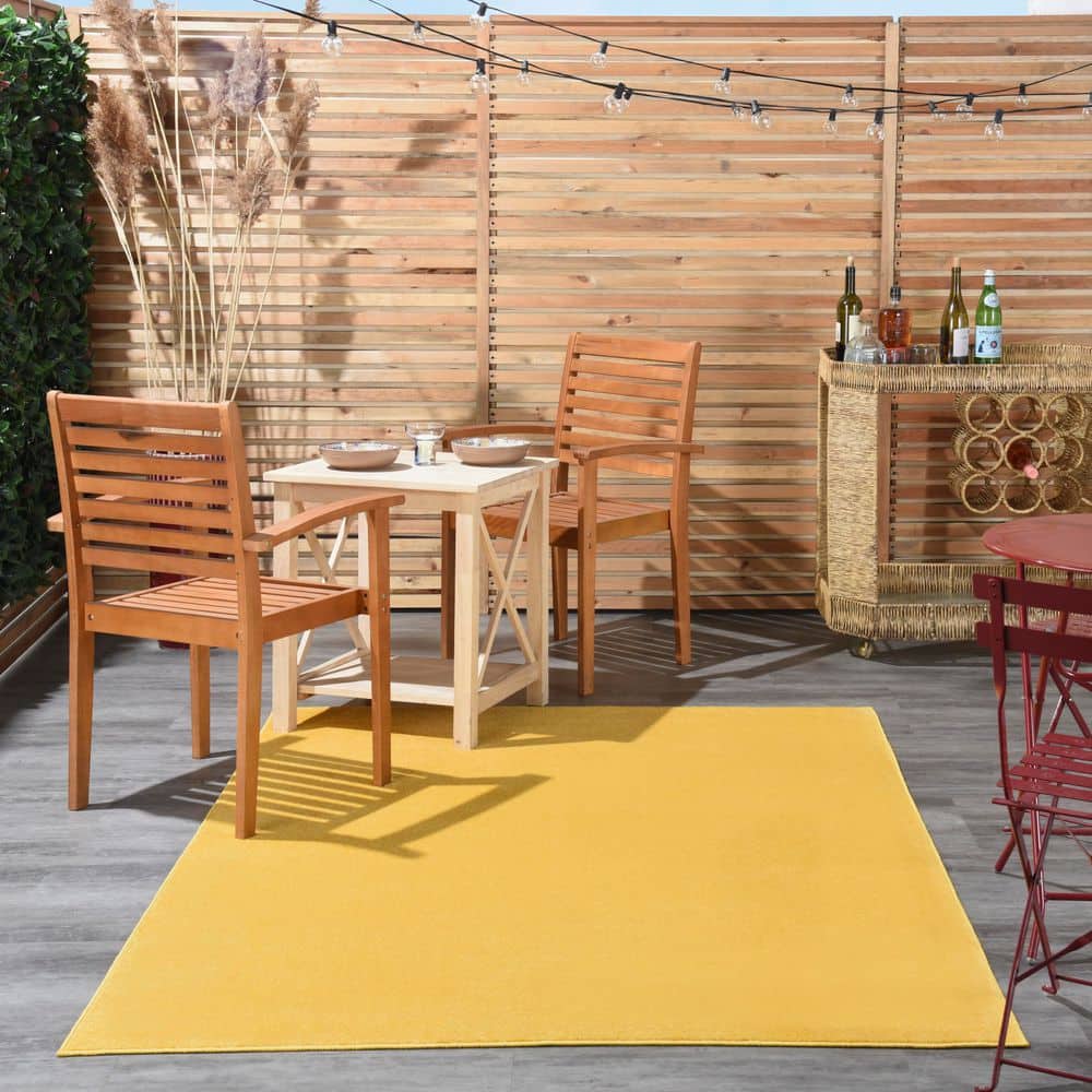 Yellow 4' x 6' Solid Synthetic Indoor/Outdoor Rug