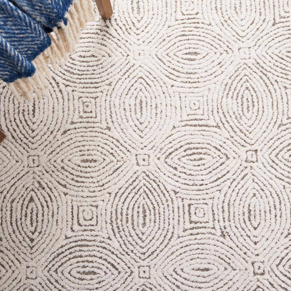 Ivory and Beige Abstract Hand-Tufted Wool Rug, 5' x 8'