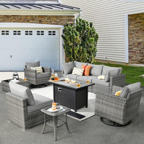 XIZZI Harlotte 9-Piece Wicker Patio Rectangular Fire Pit Set with Dark Gray Cushions and Swivel Rocking Chairs