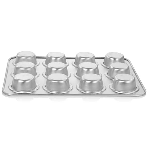 https://images.thdstatic.com/productImages/a1a223af-d964-42f6-b6ef-6a66e4ade61e/svn/silver-oster-cupcake-pans-muffin-pans-985115194m-4f_600.jpg
