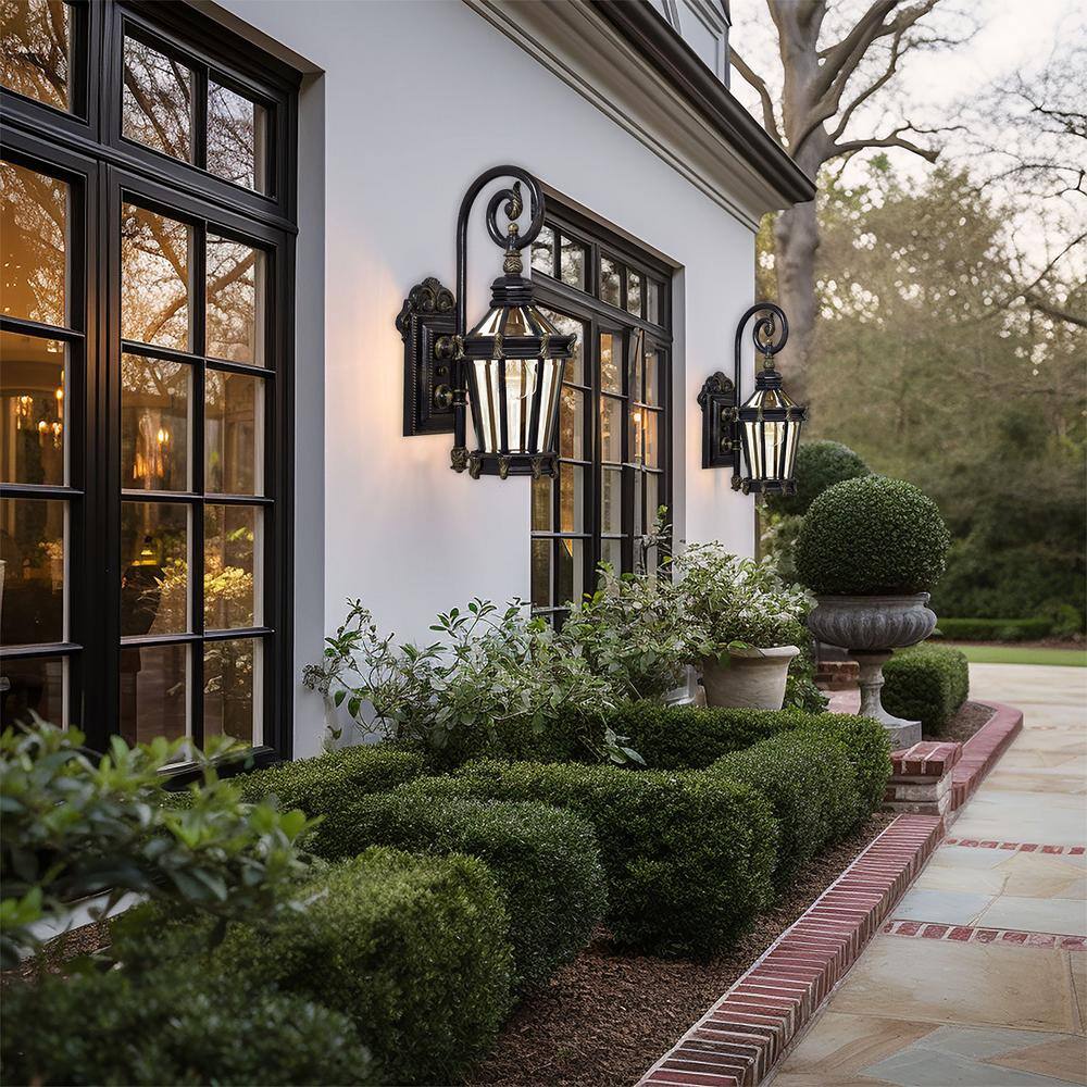 Heritage Gold and Black Outdoor Wall Lantern Sconce with Clear Glass