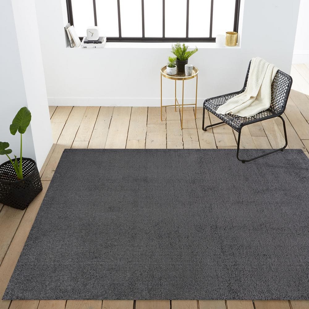 Haze Solid Black Synthetic Low-Pile Area Rug