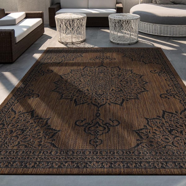 https://images.thdstatic.com/productImages/a1d08b68-96ba-49b8-a3e3-3679f9a022ed/svn/brown-black-area-rugs-out900-gold-5x7-hd-4f_600.jpg