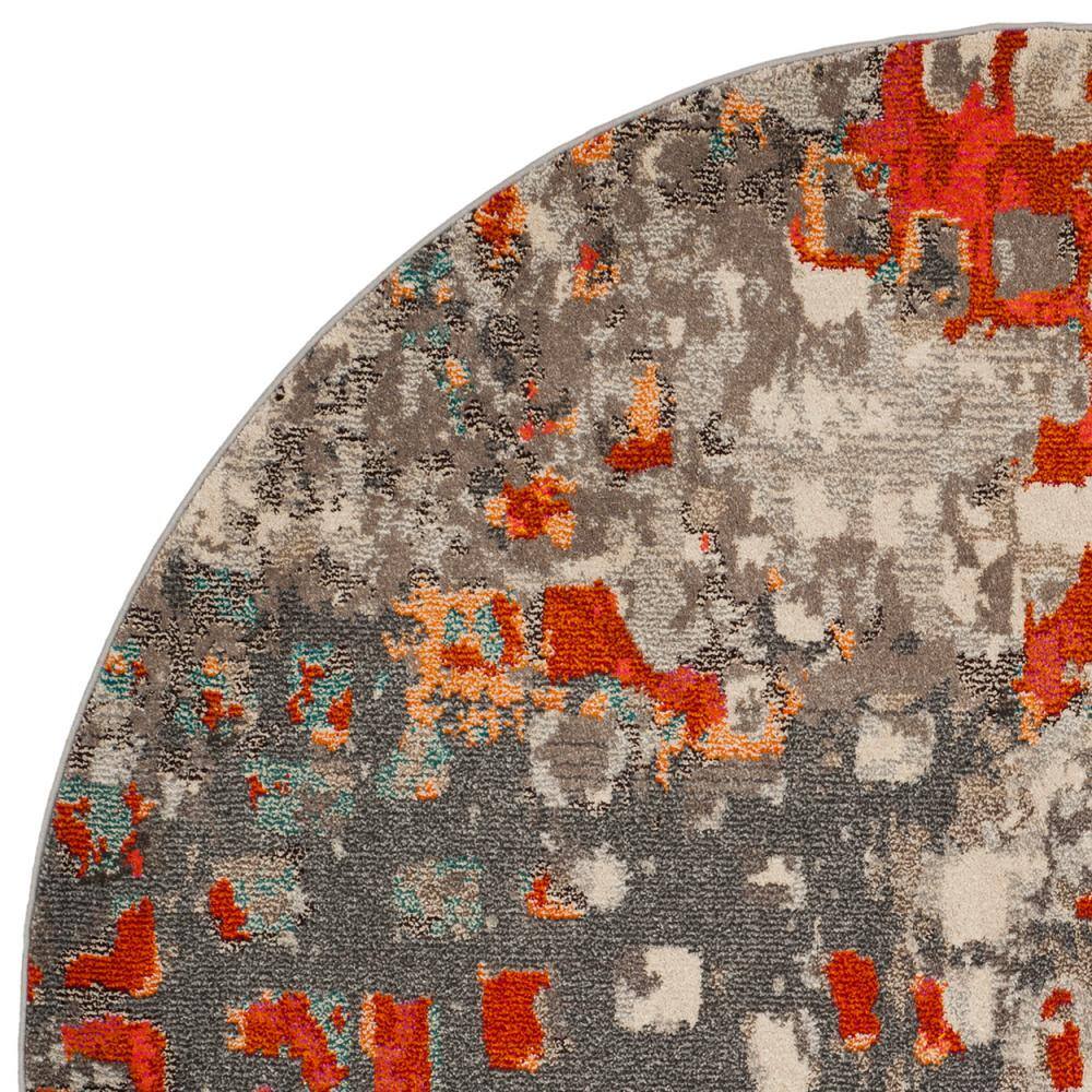 9' Round Grey and Orange Geometric Synthetic Area Rug