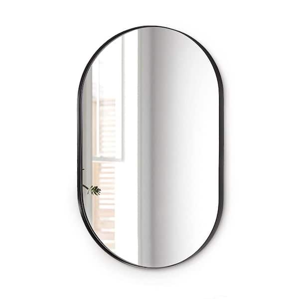 ANDY STAR 36 in. W x 1 in. H Oval Hanging Deep Metal Frame Wall Mirror