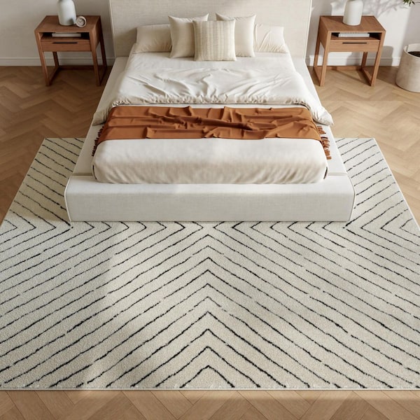 Cozy Modern Ivory Black 9 ft. x 12 ft. Abstract Contemporary Area Rug