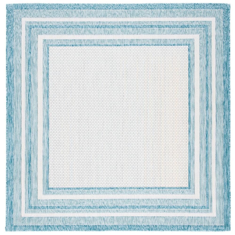 https://images.thdstatic.com/productImages/a20efc76-c3b5-4c26-9654-c28f85321309/svn/ivory-aqua-safavieh-outdoor-rugs-cy8475-53612-7sq-64_1000.jpg