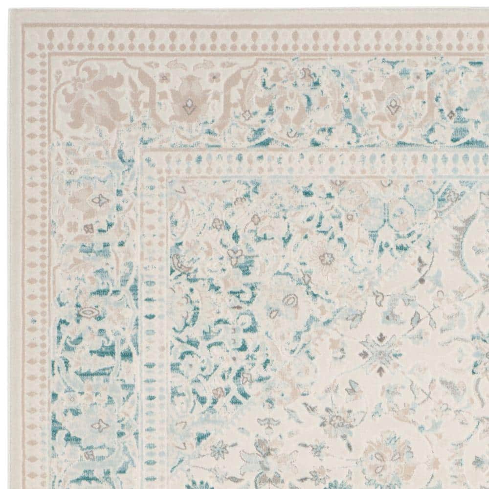 Ivory and Turquoise Rectangular Reversible Synthetic Area Rug