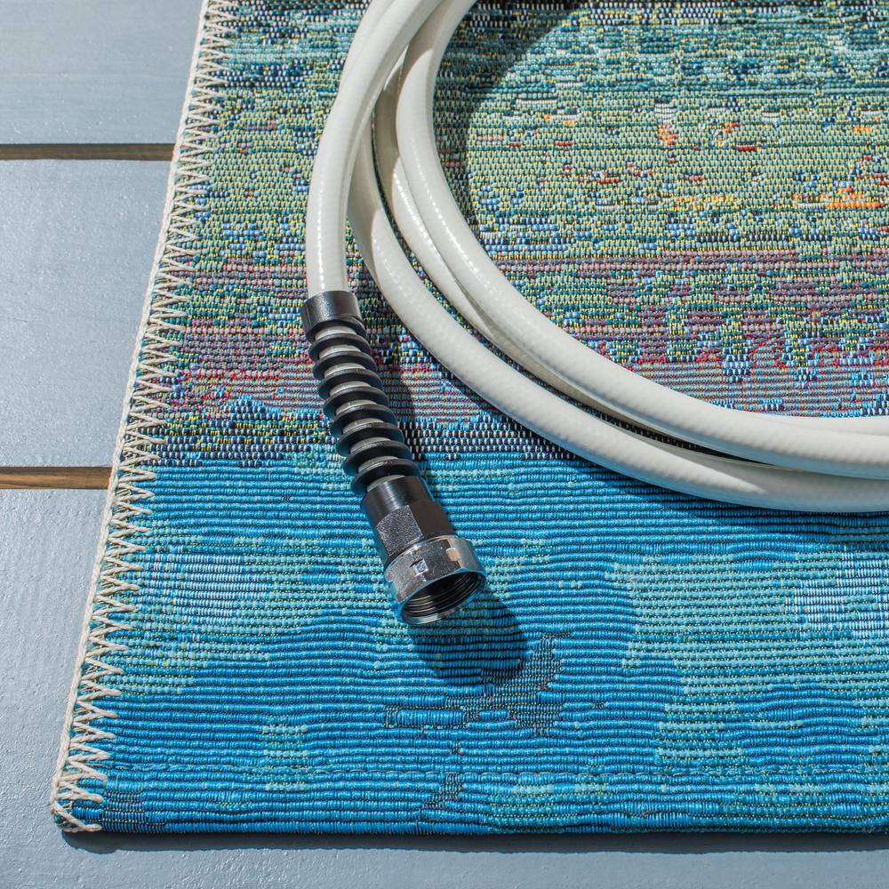 Barbados Light Blue and Pink Synthetic 8' x 10' Abstract Area Rug
