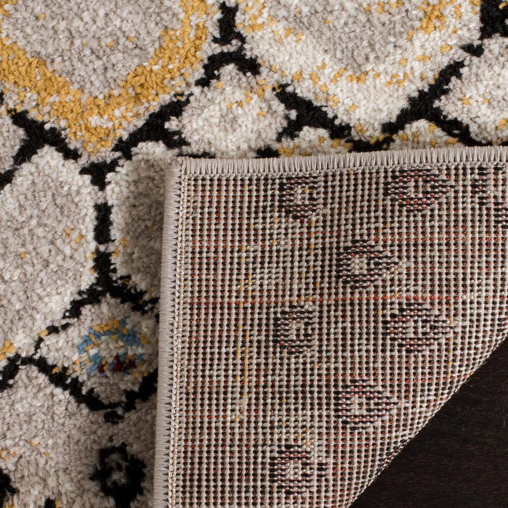 Light Grey and Multicolor Geometric 4' x 6' Synthetic Area Rug