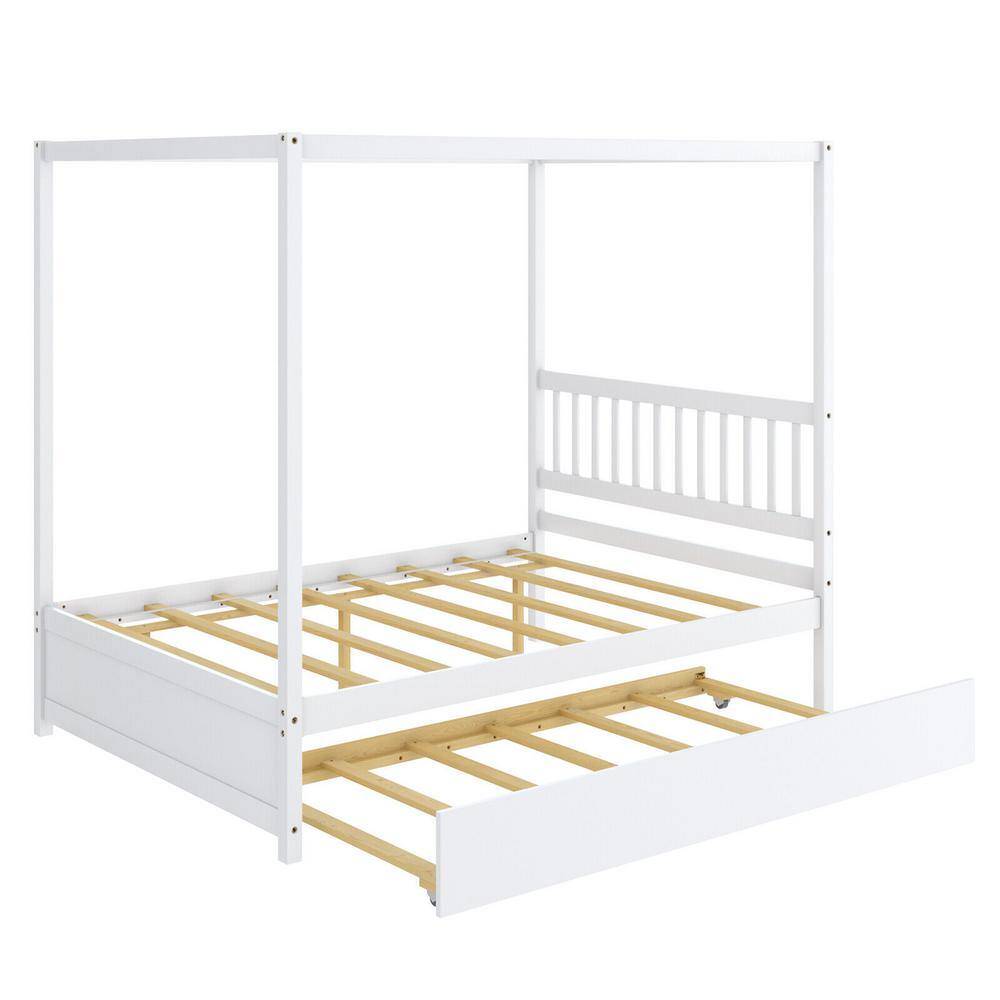 White wooden full-size platform bed with a canopy frame and a pull-out trundle bed.