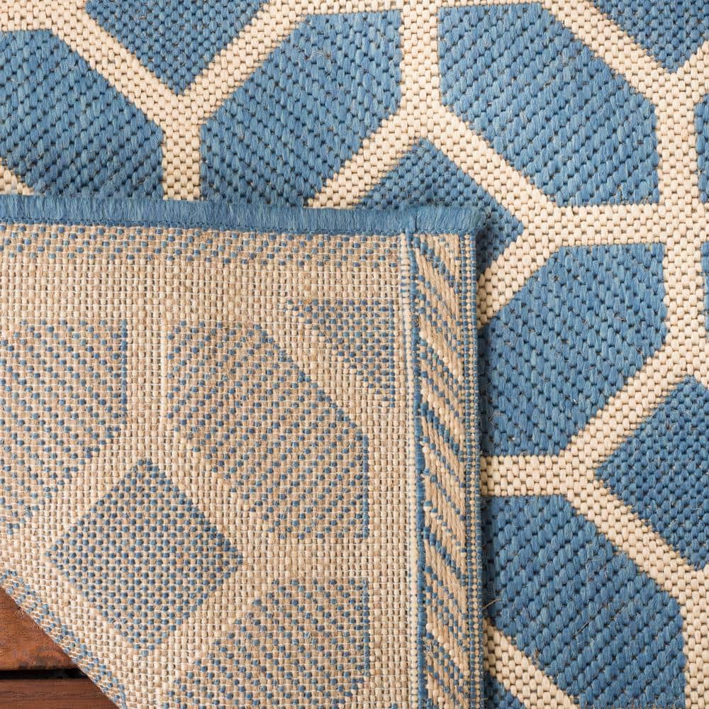 Blue and Creme Geometric Synthetic Indoor/Outdoor Accent Rug 2'-2" x 4'