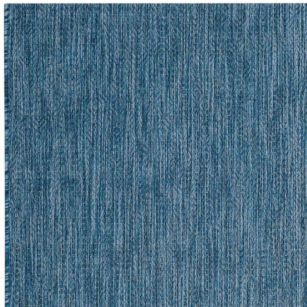 Navy Geometric Low Pile Synthetic Indoor/Outdoor Rug