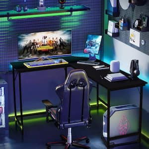 49.5 in. L-shaped Wood Black Gaming Desk Computer Desk with CPU Stand Power Outlets