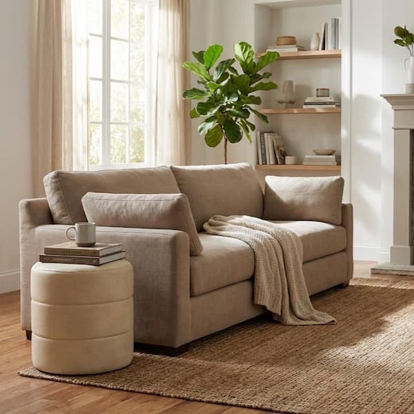 Cream Faux Leather Round Decorative Ottoman with Channeling Detail