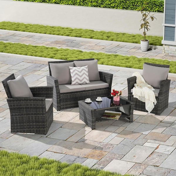 4-Piece Wicker Patio Conversation Set with Light Gray Cushions and Tempered Glass Coffee Table