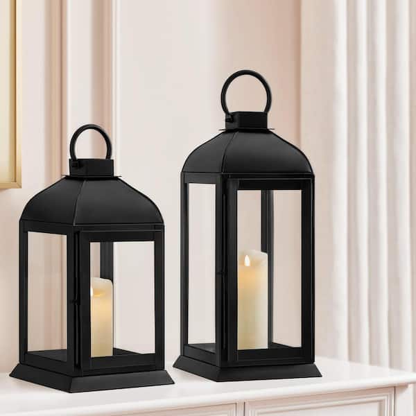 https://images.thdstatic.com/productImages/a2782489-0248-4c16-bb8a-c367e4d1364f/svn/black-home-decorators-collection-candle-holders-dc20-169340-64_600.jpg