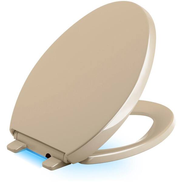 KOHLER Reveal LED Nightlight Elongated Closed Front Toilet Seat in Mexican Sand