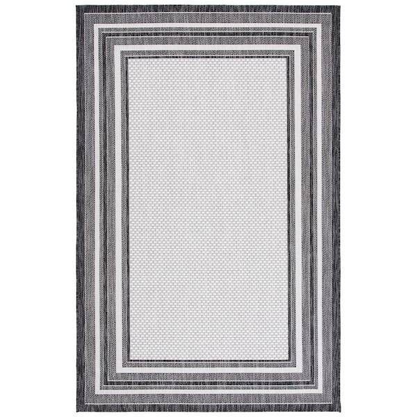 SAFAVIEH Courtyard Ivory/Black 5 ft. x 8 ft. Solid Striped Indoor/Outdoor Patio  Area Rug