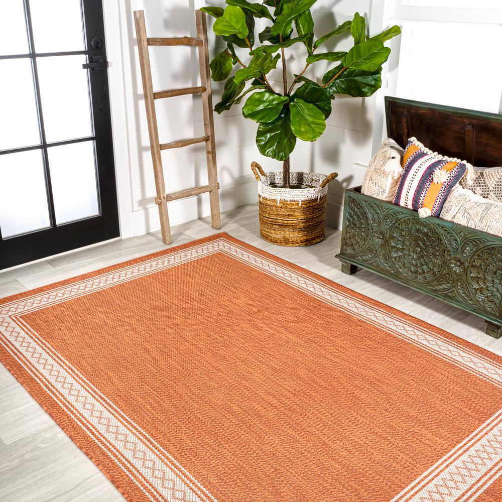 Lucia Cream and Orange Synthetic Indoor/Outdoor Area Rug