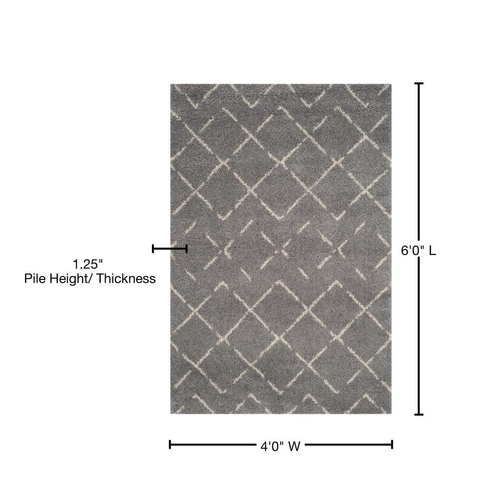 Grey and Ivory Geometric Shag 4' x 6' Area Rug