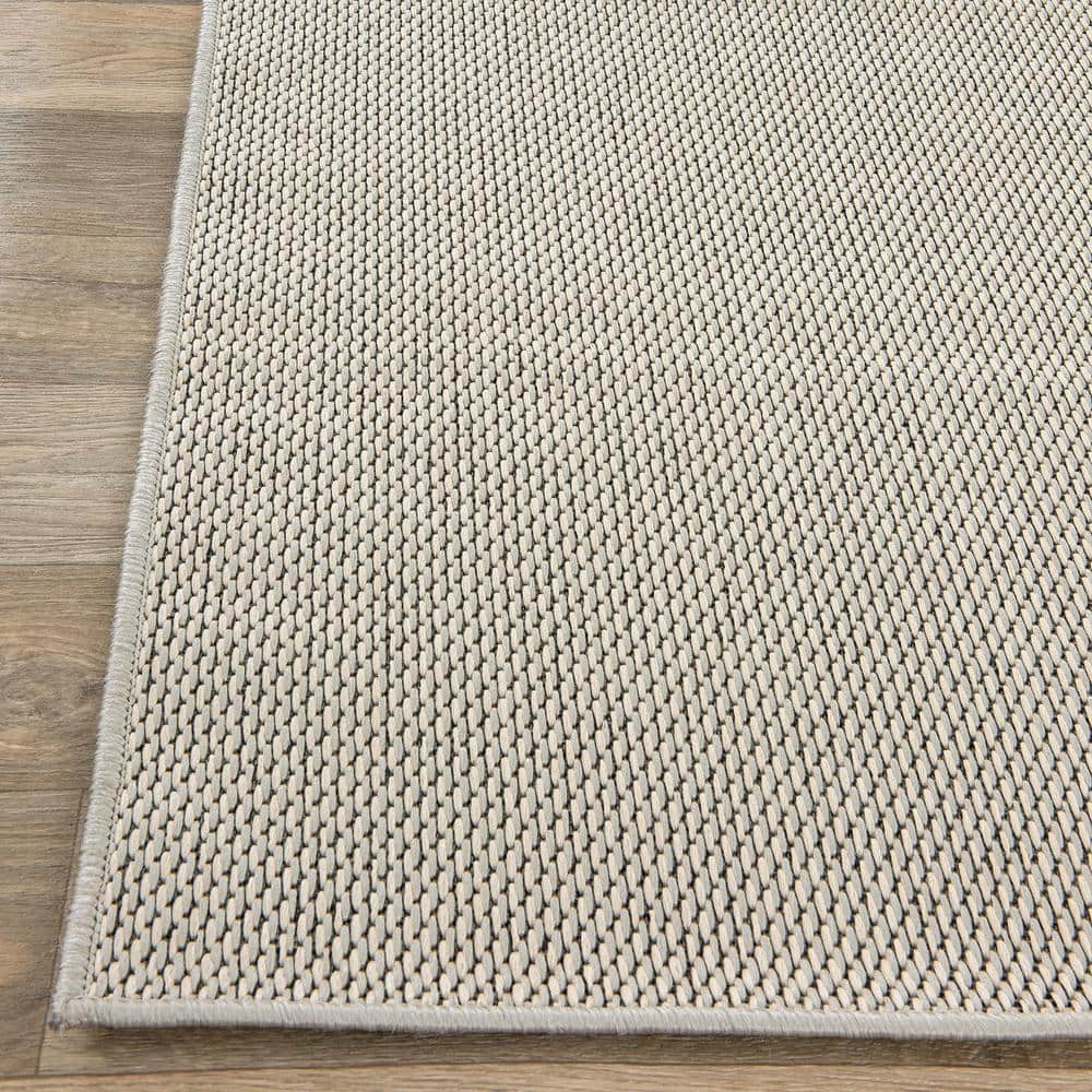 Ivory 5' x 7' Synthetic Flat Woven Reversible Rug