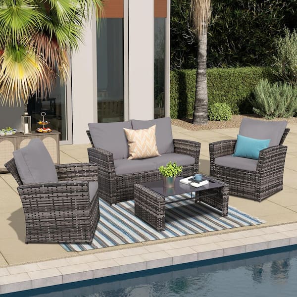 Cesicia 4-Piece Gray Wicker Outdoor Furniture Sectional Set with Glass Table and Gray Cushions