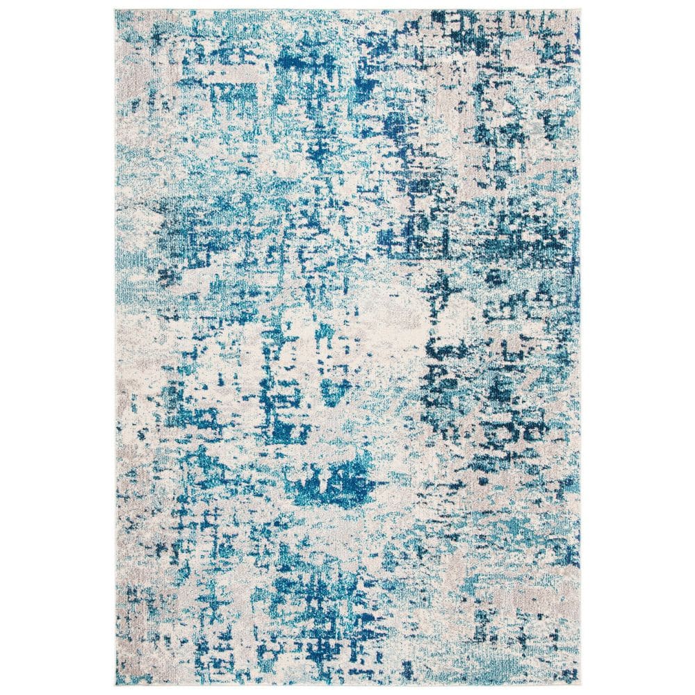 Ivory and Turquoise Abstract 8' x 10' Synthetic Area Rug