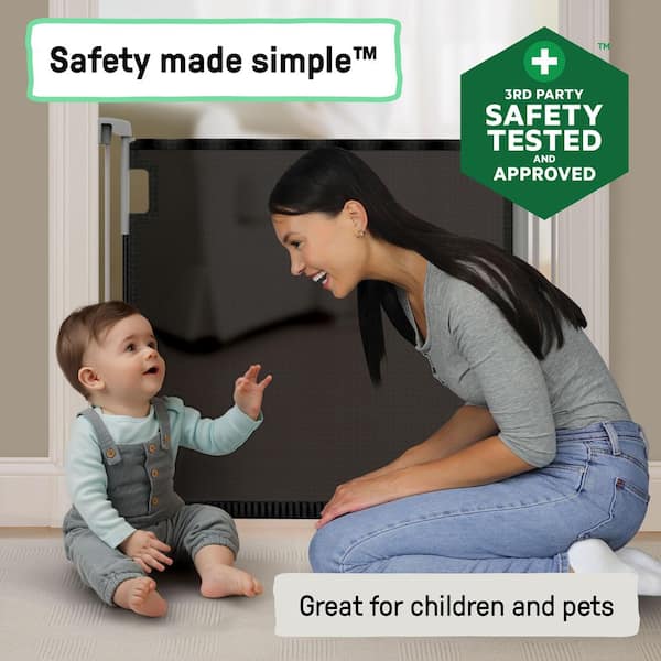 INGENUITY The Thruway 52W Series Pet and Baby Retractable Gate