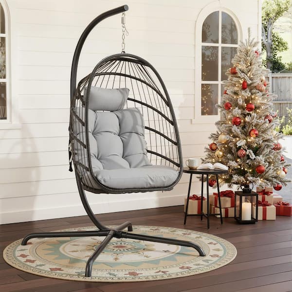 FINCATI 1-Person 350 lbs. Capacity Foldable Gray Wicker Egg Porch Swing Chair with Steel Stand and Light Gray Cushion for Patio