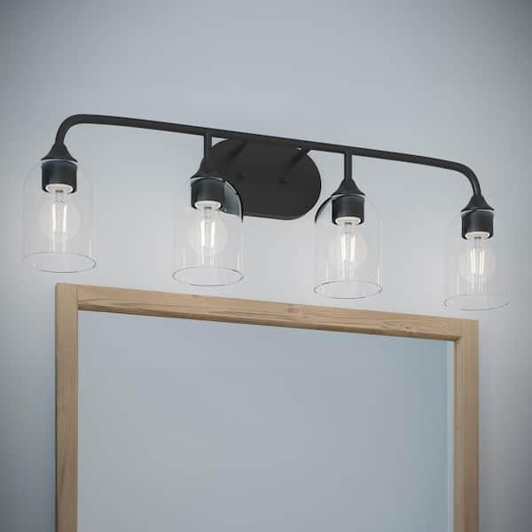 Ilia 31 In. 4-Light Matte Black Transitional Bath Vanity Light with Clear Glass Shades