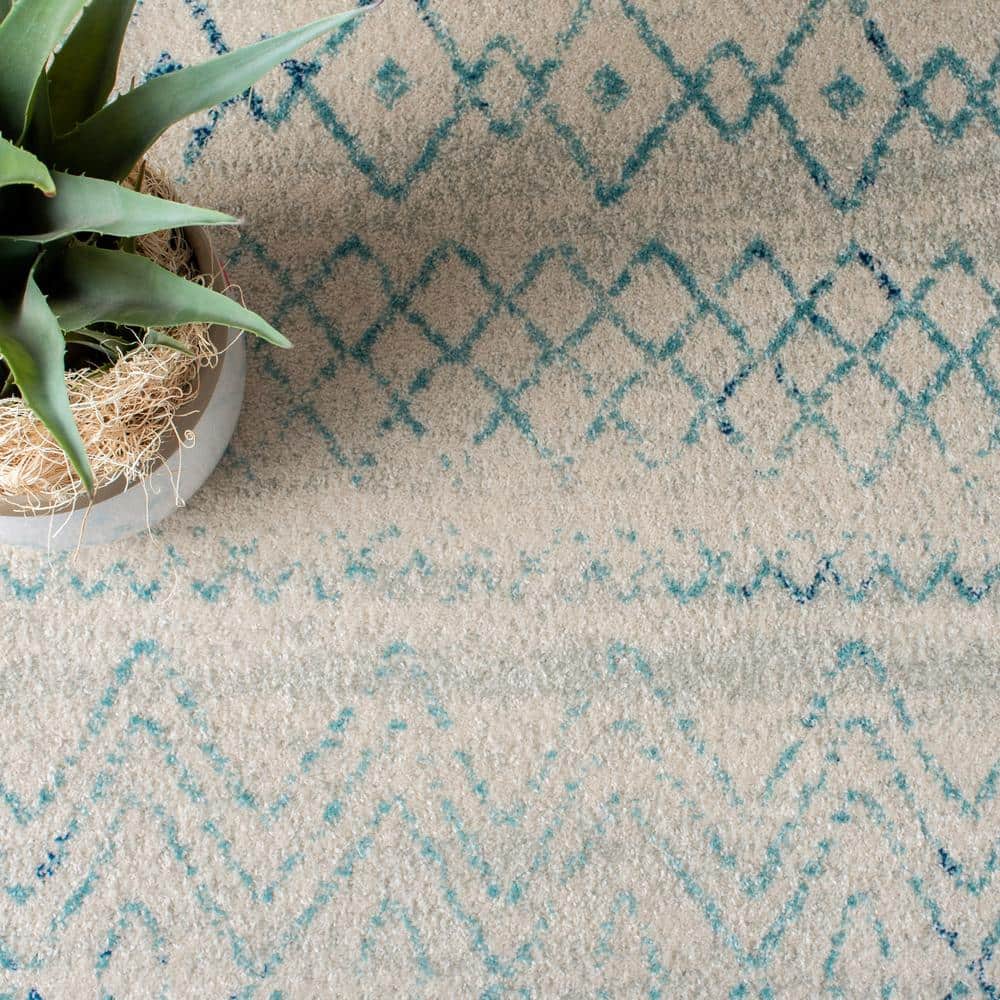 Elegant Ivory/Aqua Synthetic 9' x 12' Hand-Knotted Area Rug