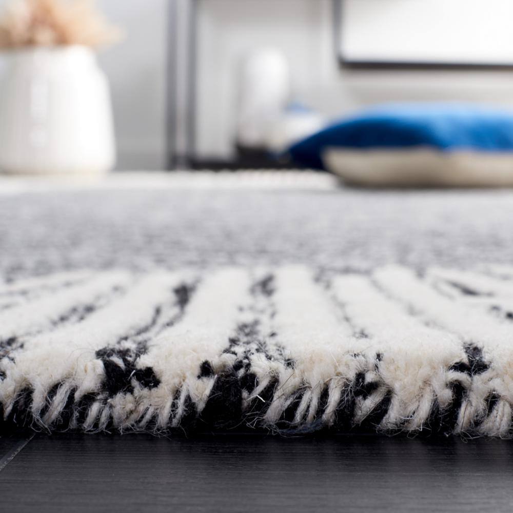 Black and Ivory Abstract Handmade Wool Tufted Rug, 8' x 10'