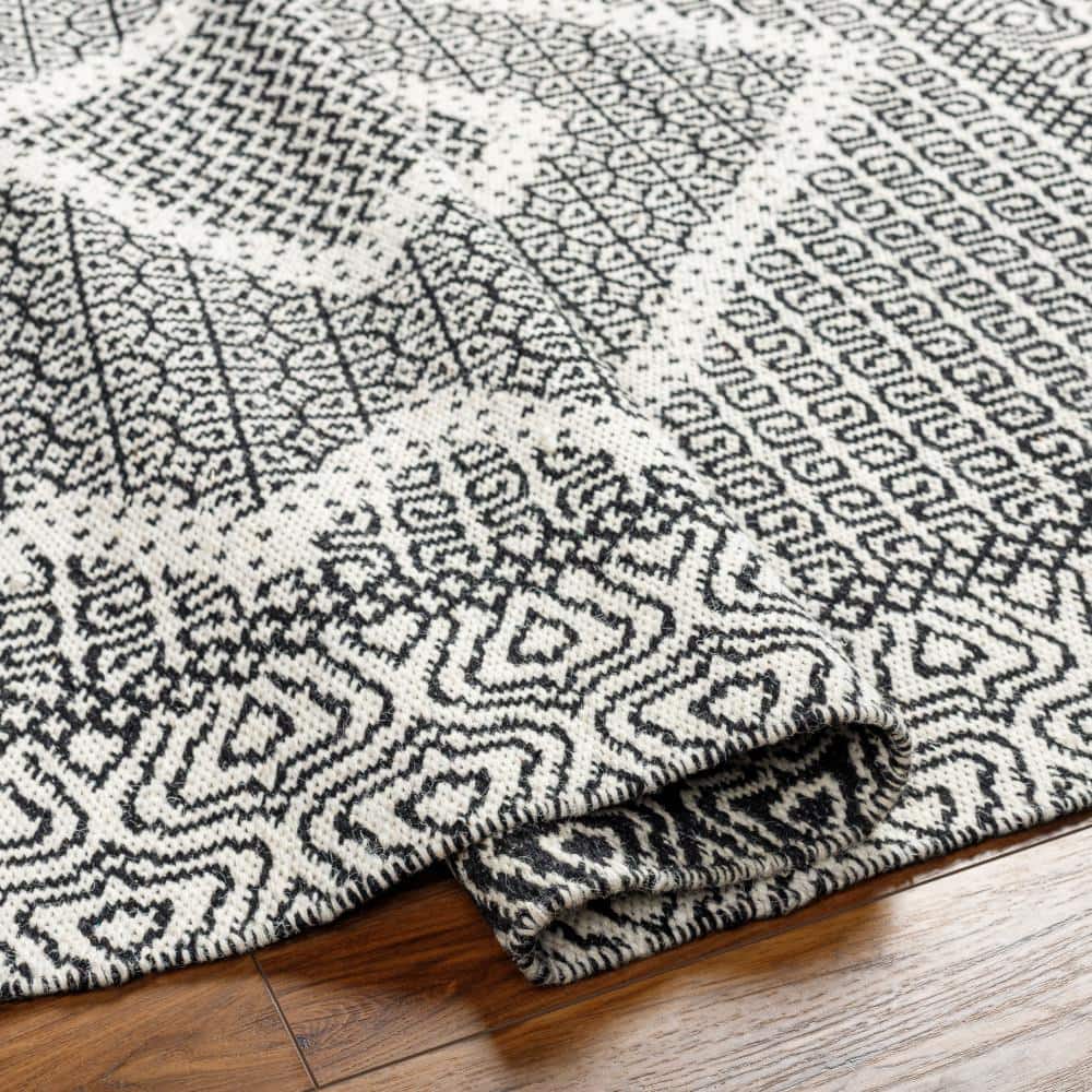 Handwoven Black Wool Spot Rug with Fringe 2'x3'