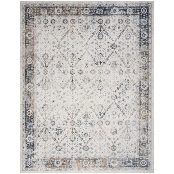 Nourison Astra Machine Washable Ivory Blue 7 ft. x 9 ft. Distressed Traditional Area Rug