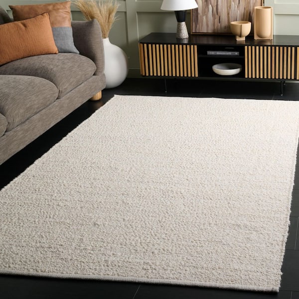 Natura 8 ft. x 10 ft. Ivory Solid Distressed Area Rug
