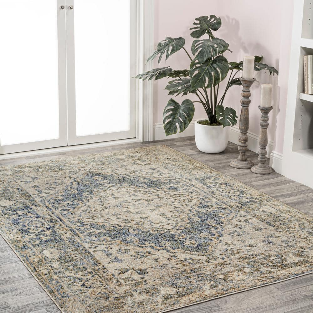 Pavel Distressed Blue and Cream Synthetic Medallion Washable Area Rug 5'3" x 7'7"