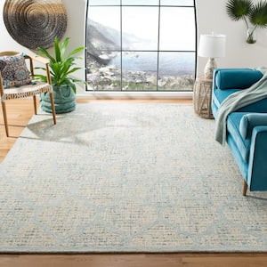 Abstract Ivory/Turquoise 8 ft. x 10 ft. Distressed Quatrefoil Area Rug