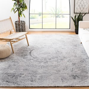 Abstract Ivory/Black 9 ft. x 12 ft. Distressed Medallion Area Rug