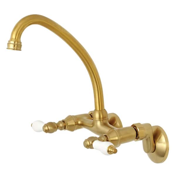 Kingston Brass Kingston 2-Handle Wall-Mount Standard Kitchen Faucet in Brushed Brass