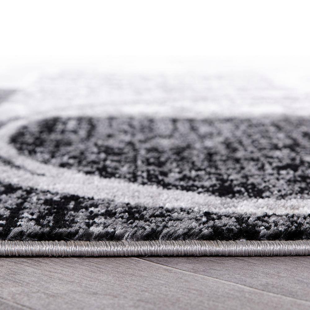Cream and Gray Abstract Synthetic Area Rug 3'3" x 5'