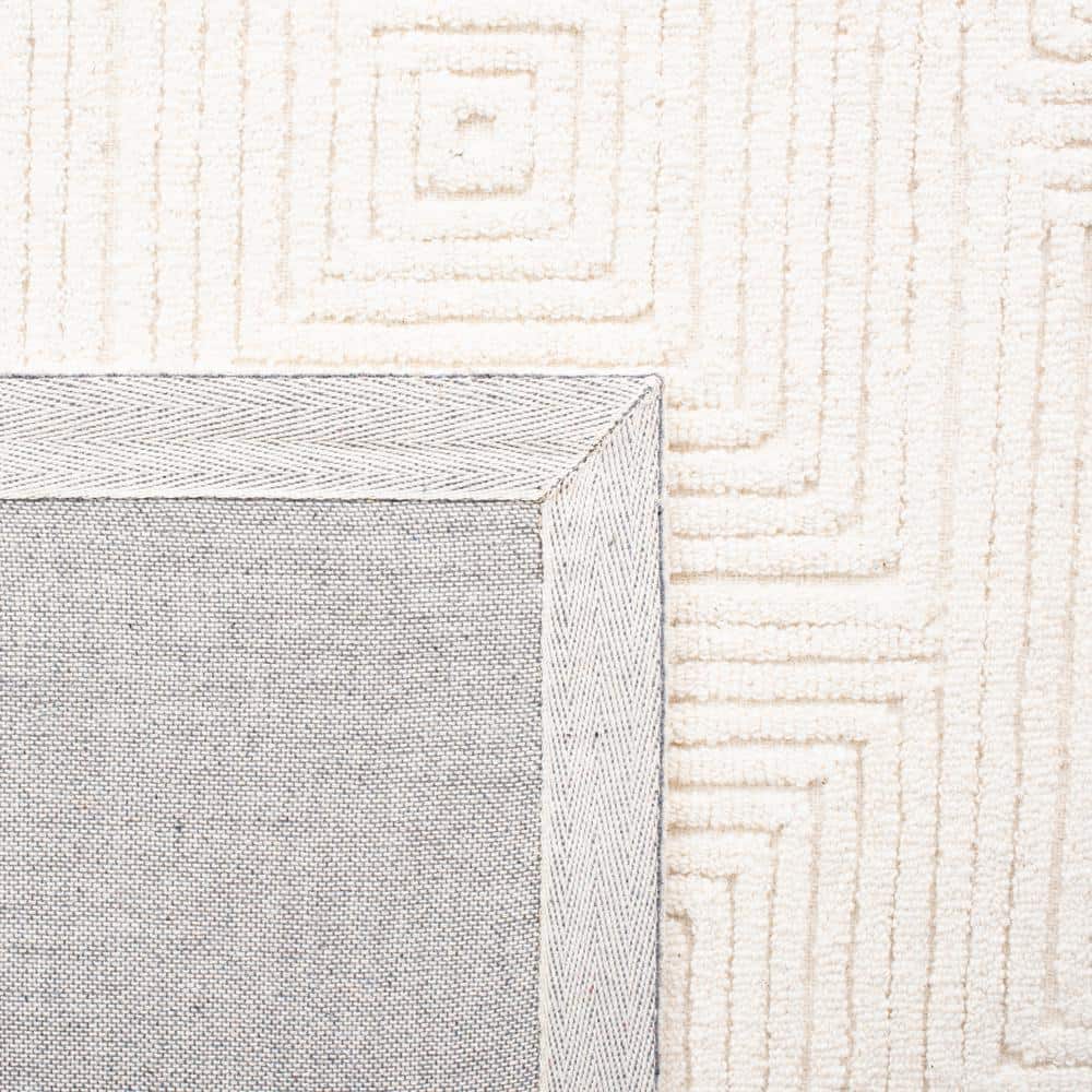 Ivory Geometric Handmade Wool Round Tufted Rug