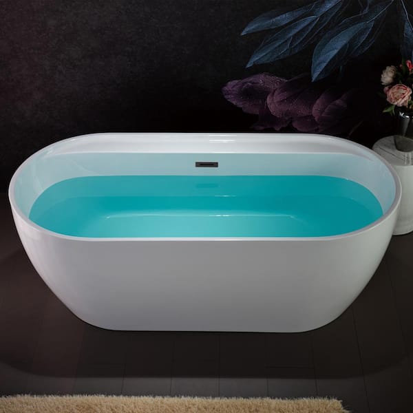 WOODBRIDGE 67 in. x 31.5 in. Soaking Bathtub with Center Drain in White with Oil Rubbed Bronze Trim