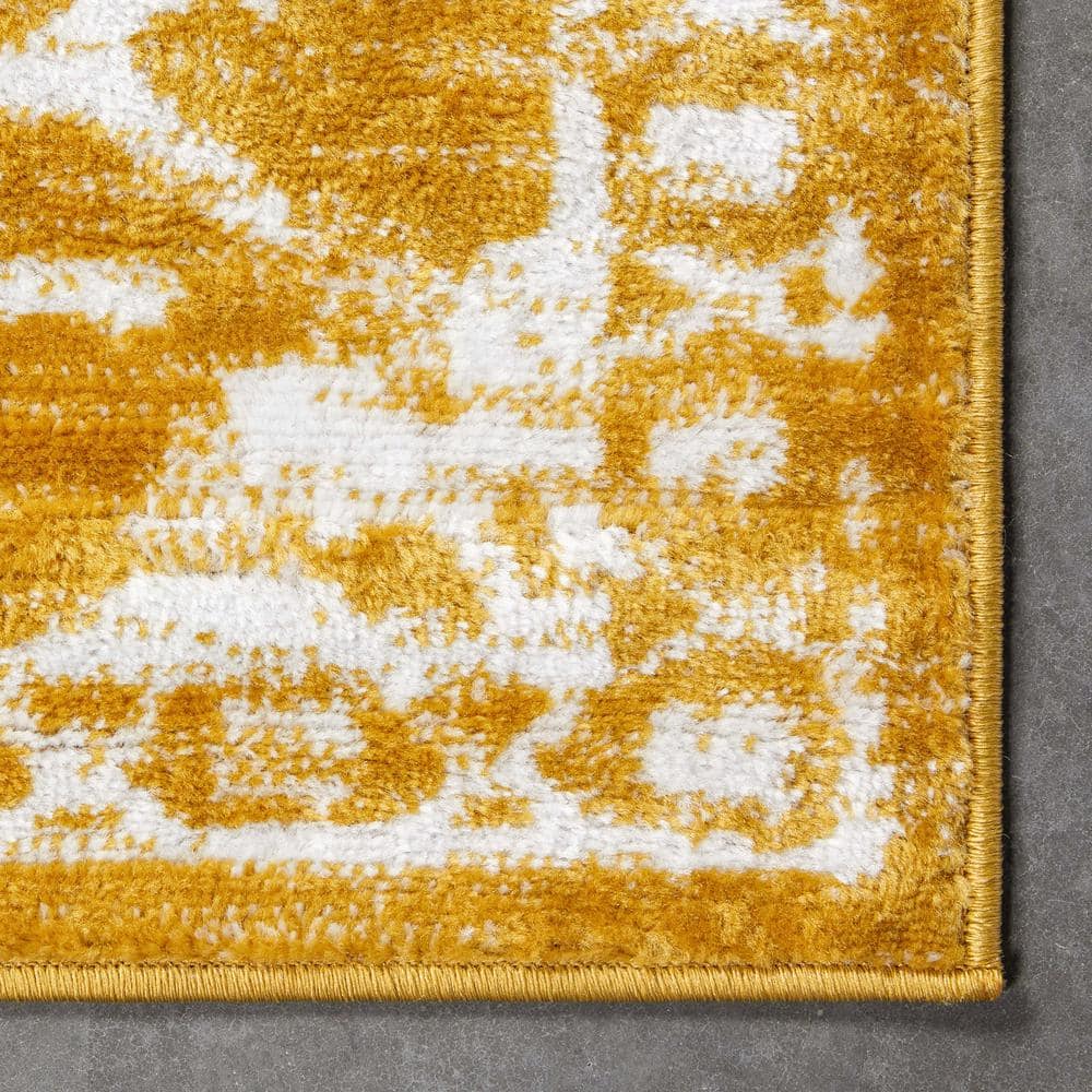Gold 5' x 7' Synthetic Oriental Easy Care Rug