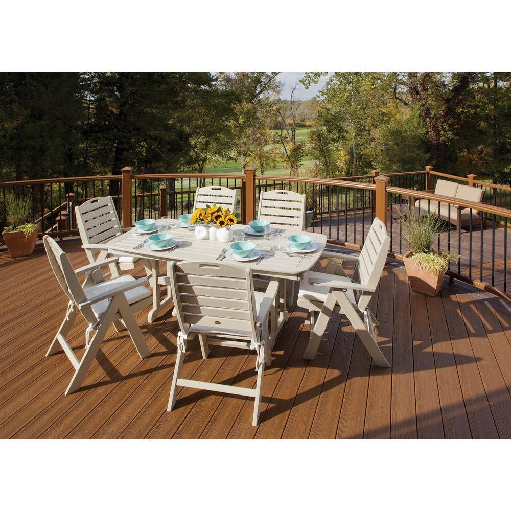 Beige Trex Outdoor Furniture dining set on a wooden deck